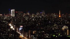 TOKYO, JAPAN : Aerial sunrise CITYSCAPE of TOKYO. View of dawn city and buildings at central downtown area. Japanese urban city life and metropolis concept. Long time lapse video, night to morning.