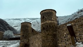 Medieval-style mountain monastery in winter - Powered by Shutterstock - Get 15% off with code: PIKWIZARD15