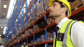 Animation of network of digital icons on caucasian male supervisor using digital tablet at warehouse. Global networking and logistics business technology concept - Powered by Shutterstock - Get 15% off with code: PIKWIZARD15