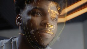 Face portrait of young African American man with concentrated look. 3D animation of human futuristic biometric AI facial recognition. Identification for access. Privacy and modern scanning technology. - Powered by Shutterstock - Get 15% off with code: PIKWIZARD15