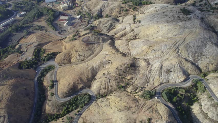 Scenic 99 Bends Road On Lyell Highway (A10 Route). Curvy Winding Road Over The Mountains Above Queenstown In Tasmania. aerial topdown