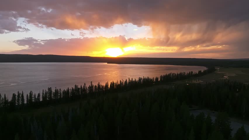 A panoramic aerial view of Yellowstone Lake at sunset. Huge lake the size of the sea.
