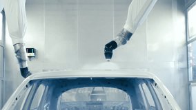 Robotic Arms Spray Painting a Vehicle Body at a Car Manufacturing Factory. 4K . 1 - Powered by Shutterstock - Get 15% off with code: PIKWIZARD15