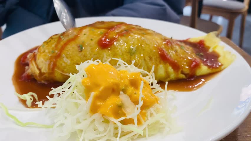 Omurice placed in a restaurant in Gangnam, Seoul, South Korea