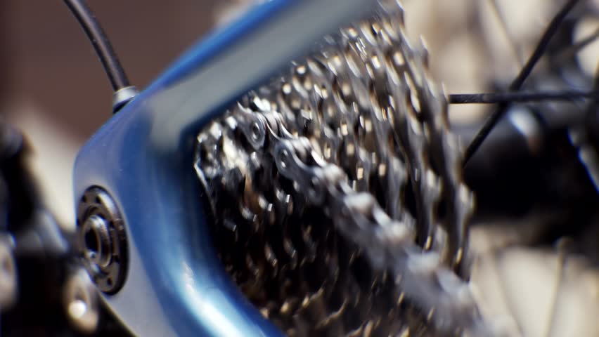 Cyclist On Bicycle Drivetrain System Chain Rotating. Gear System 
Bike Wheel. Cycling Drivetrain Derailleur Chain Cassette Spokes. Cyclist Chain Gear Shifting. Cycling Cranckset Bike Wheel Gearshift Royalty-Free Stock Footage #1102781391