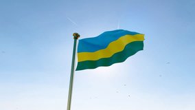 Rwanda national flag waving in beautiful blue sky. Flag of Rwanda waving in the wind, sky and sun background. Rwanda Flag Video. Realistic Animation, 4K UHD. 