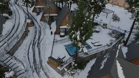 Aerial video of the Panda Hotel and Spa in a snowy winter, Neve Ativ, Israel