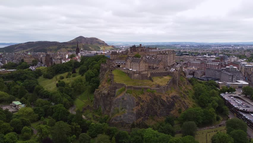 AERIAL: Edinburgh Castle panoramic cinematic view. Scotland. Royalty-Free Stock Footage #1102804773