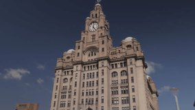 4K: Hyperlapse of Liver Building in Liverpool, Merseyside, UK with Sunny weather and blue sky. City Time Lapse. Stock Video Clip Footage