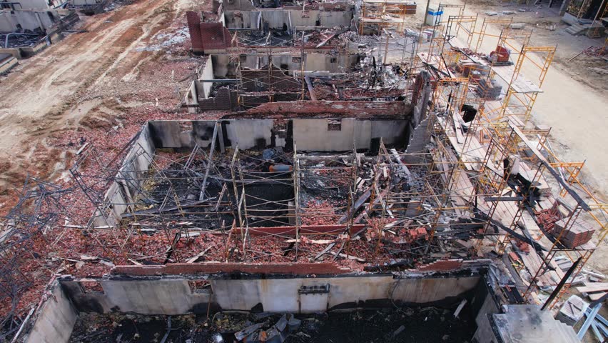 Aftermath of large fire in windy hot and dry day in Vaughan, Ontario, Canada. Houses units severely damaged in major Vaughan fire. Fire near Pine Valley Drive and Teston Road on April 12, 2023