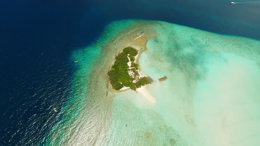 Uninhabited island in the ocean in the Maldives
