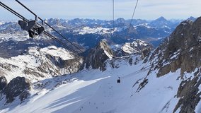 Skiing season footage on top of Marmolada glacier, the highest point in the Dolomites mountains in Italy	