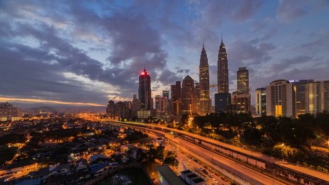Time lapse of beautiful sunrise in Kuala Lumpur, Malaysia. High quality, Ultra HD, 4K resolution. Pan Effect