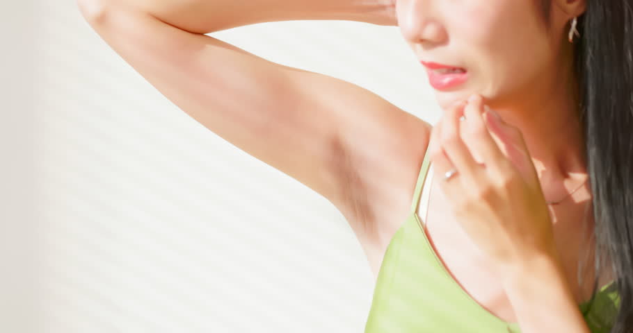 closeup asian female got armpit skin darkness problem - she feels so unhappy and worried about smelly issue Royalty-Free Stock Footage #1102828667