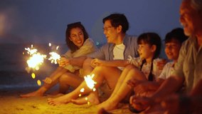 4K Group of Happy Multi-Generation Asian family enjoy and fun outdoor activity lifestyle playing sparklers firework together at tropical beach at sunset during travel ocean on summer holiday vacation. - Powered by Shutterstock - Get 15% off with code: PIKWIZARD15