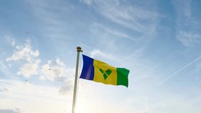 Flag of Saint Vincent waving in the wind, sky and sun background. St Vincent and the Grenadines Flag Video. Realistic Animation, 4K UHD. 3D Animation
