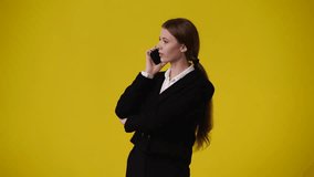 4k video of one girl having a talk over the phone.