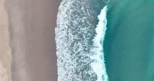 (Top-view) wave on beach sand Aerial view video High quality cinematic scene in sunset time Tropical sea Phuket Thailand Travel on March 2023