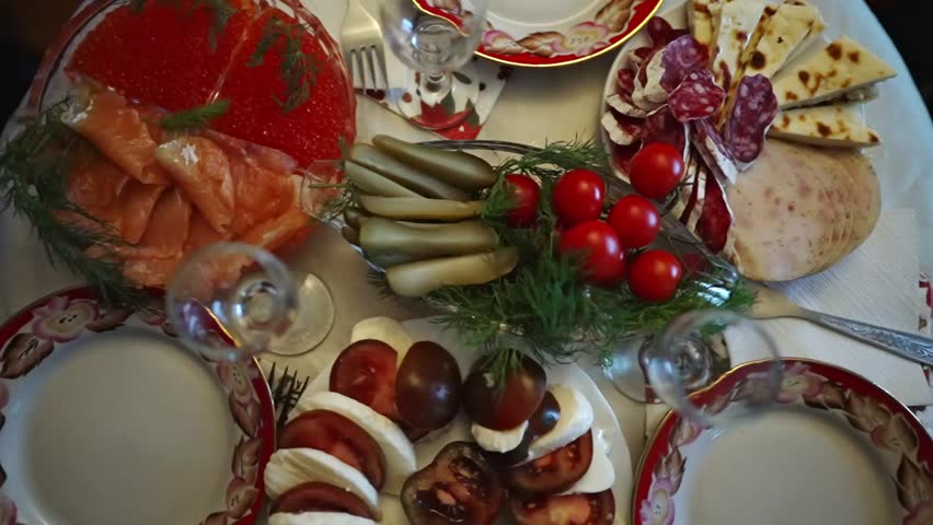 Feast in the Soviet style. Snacks and glasses for vodka.
