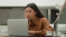 Tired bored Asian businesswoman girl sit in cafe working on laptop sad exhausted chinese japanese korean woman lady lazy student executive manager fatigued with studying online lack energy overworked - Powered by Shutterstock - Get 15% off with code: PIKWIZARD15