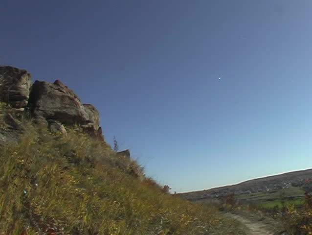 Mountain Bike Rider Drops off Cliff