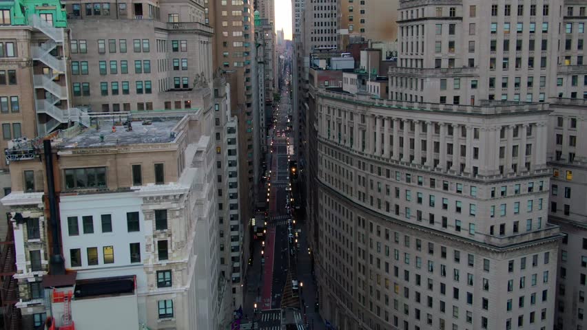 COVID Empty Streets of NYC Broadway downtown Manhattan financial district buildings Battery Park city skyline drone aerial view sunrise Royalty-Free Stock Footage #1102872117