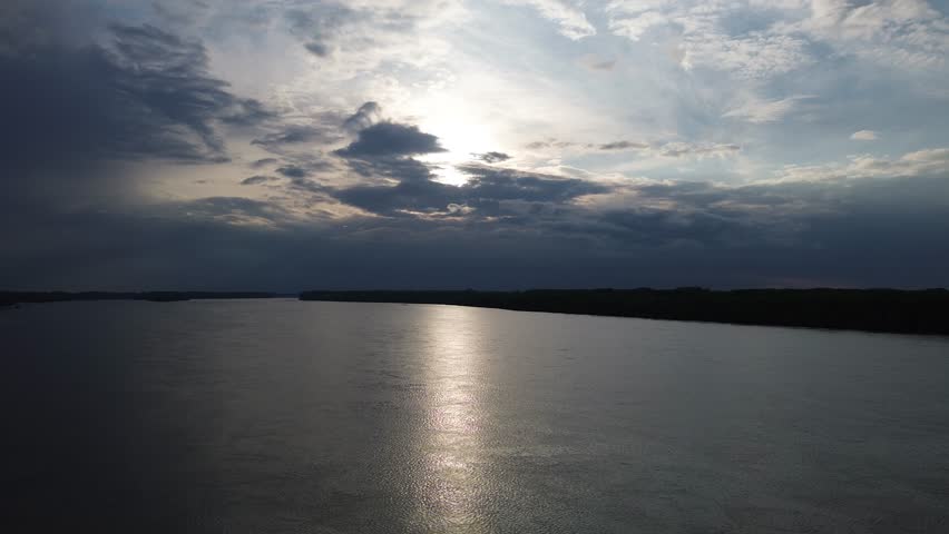 Drone flight over Danube river sunset