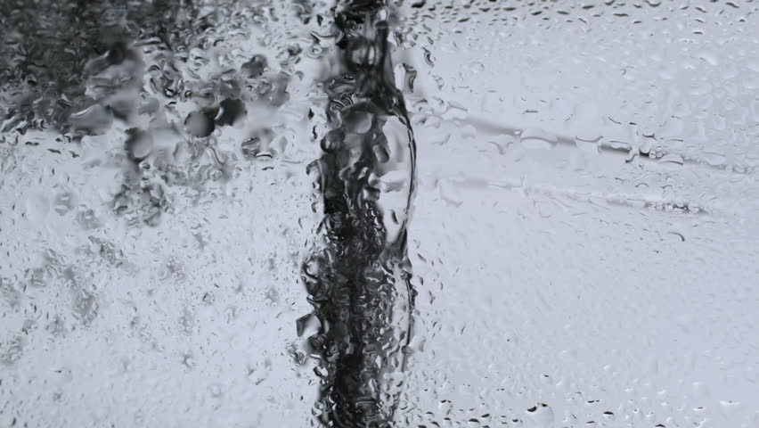 Pouring fresh clean water into glass, extreme macro. Refreshing morning with water. Vertical footage