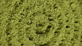 Heap of matcha green tea powder. Healthy drinks concept. Vertical video