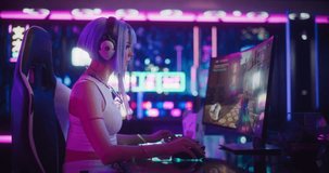 Professional Beautiful Female eSports Gamer Playing 3D Shooter Video Game with Modern Graphics on Her Computer. Stylish Futuristic Cyberpunk Gaming Neon Room with Cosplay Gamer Girl in Headphones