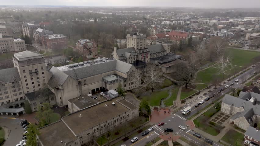 Indiana University Memorial Union building on the campus if Indiana University in Bloomington, Indiana with drone video moving forward.
