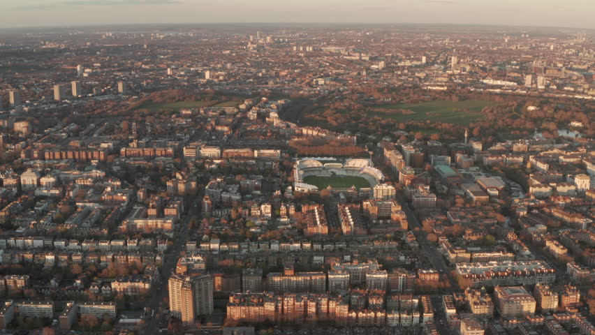 Circling aerial shot over Lords cricket ground at sunset Royalty-Free Stock Footage #1102896103