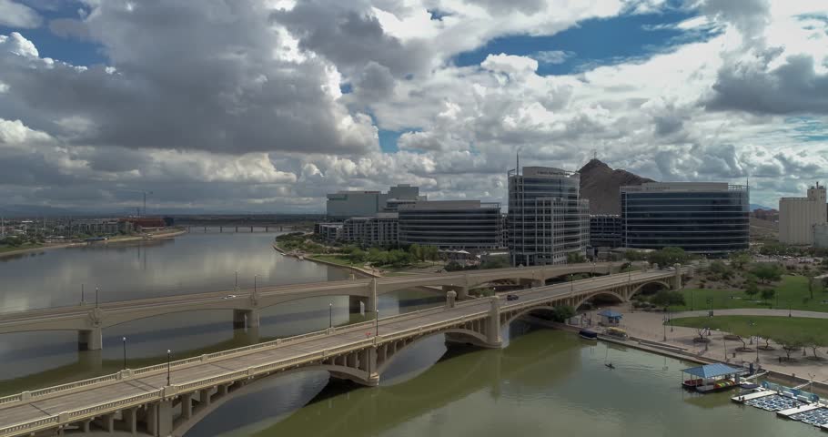 Downtown of Tempe in Arizona, America, hyperlapse over river on a cloudy day