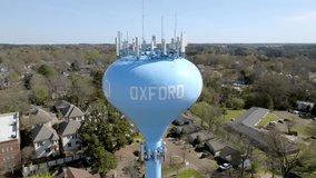 Oxford, Mississippi water tower with drone video pulling back.
