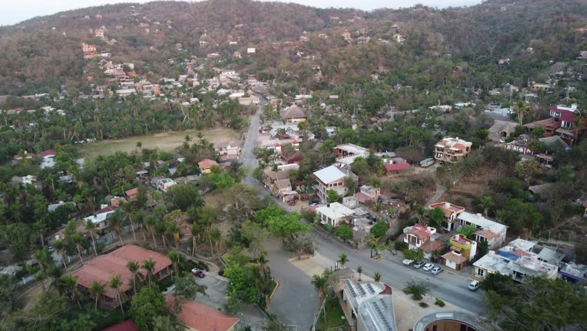 Aerial view of Mexican Mazunte village near the sea shore on a sunny day
