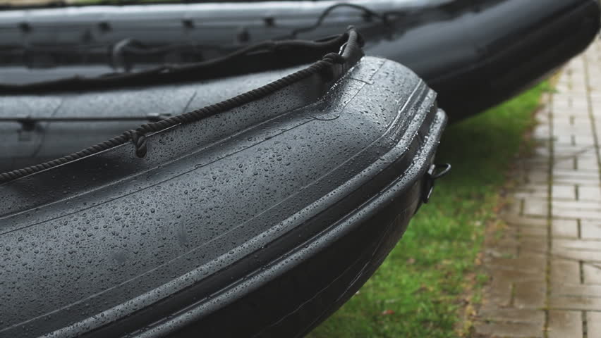 Rubber boat tactical army. Boat in drops.