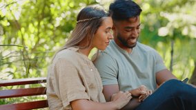 Happy couple, phone and laughing on park, bench and garden for social media post, funny meme and online joke. Man, woman and people in love relaxing outdoor with smartphone, mobile app and technology - Powered by Shutterstock - Get 15% off with code: PIKWIZARD15