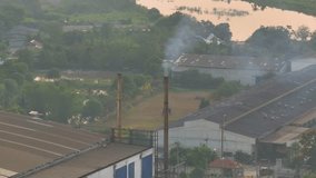 Industrial exhaust fumes can be seen as plumes of smoke or haze. The fumes may contain pollutants that can harm human health and the environment, and their dispersion and impact on air quality. 4K
