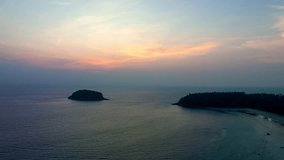 aerial hyperlapse view day to night scenery pink light shine through on sky at sunset.
Scene of Colorful romantic sky in sunset or sunrise.
aerial view beautiful landscape above Kata beach Phuket