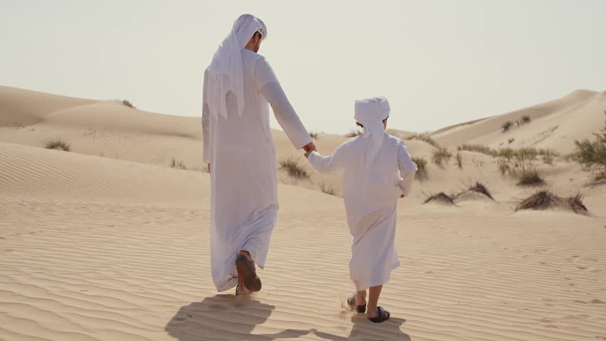 family spending time in the desert making a safari in Dubai. Concept about middle eastern cultures and lifestyle in the emirates Royalty-Free Stock Footage #1102927069