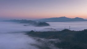 Hyper lapse video 4k motion, Aerial view Beautiful of morning scenery Golden light sunrise And the mist flows on high mountains. Pang Puai, Mae Moh, Lampang, Thailand.