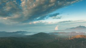 Hyper lapse video 4k motion, Aerial view Beautiful of morning scenery Golden light sunrise And the mist flows on high mountains. Pang Puai, Mae Moh, Lampang, Thailand.