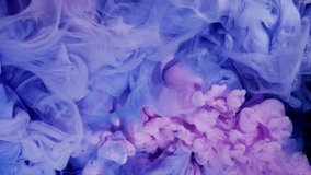 Magic mixing of color. Cloud of silky ink in water isolated on black background. Colorful ink in water, ink drop. Purple, blue, pink - Powered by Shutterstock - Get 15% off with code: PIKWIZARD15