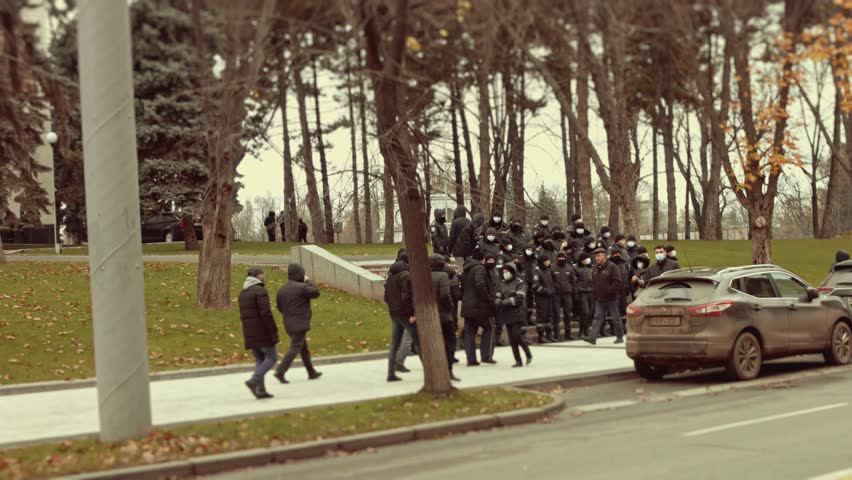Chisinau, Republic of Moldova - December 06, 2020: Moldovan people meeting for a peaceful political demonstration, protesting against the government, wearing protective face masks against Coronavirus