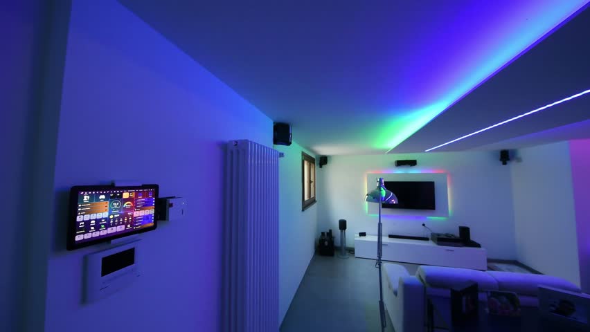 Modern room with bright led strips light. Tv, monitor and sofa - Powered by Shutterstock - Get 15% off with code: PIKWIZARD15