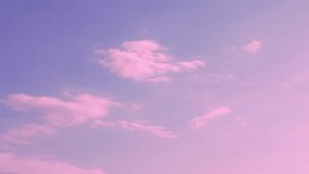Pink Lilac Sky Atmosphere with Pink Transforming Clouds, Aerial Drone View, Time Lapse of A Colorful Cloud at Sunset. Beauty, Relaxation, 4K Background. Pink Lilac Skuscraper with Clouds. - Powered by Shutterstock - Get 15% off with code: PIKWIZARD15