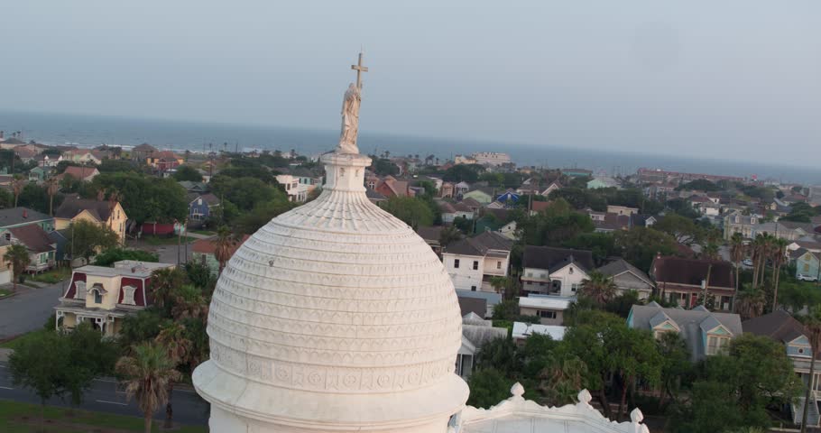 Drone view of Statue on top of the Sacred Heart Catholic Church in Galveston, Texas