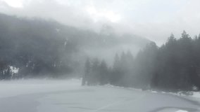 Narnia in Real Life: Drone Video of a Snowy Lake covered with the fog - Powered by Shutterstock - Get 15% off with code: PIKWIZARD15
