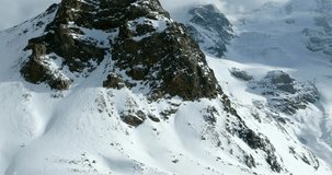 Pan-up drone video of the Diavolezza glacier in Switzerland