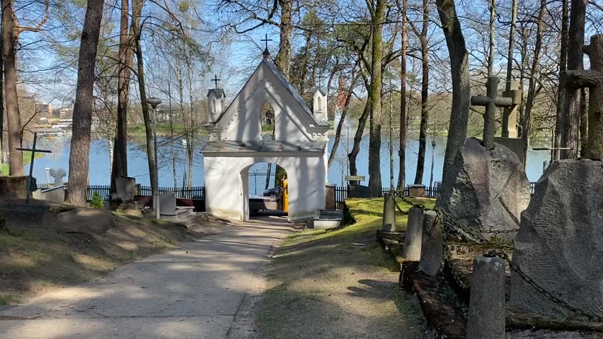 an old cemetery and church bells ringing in the distance